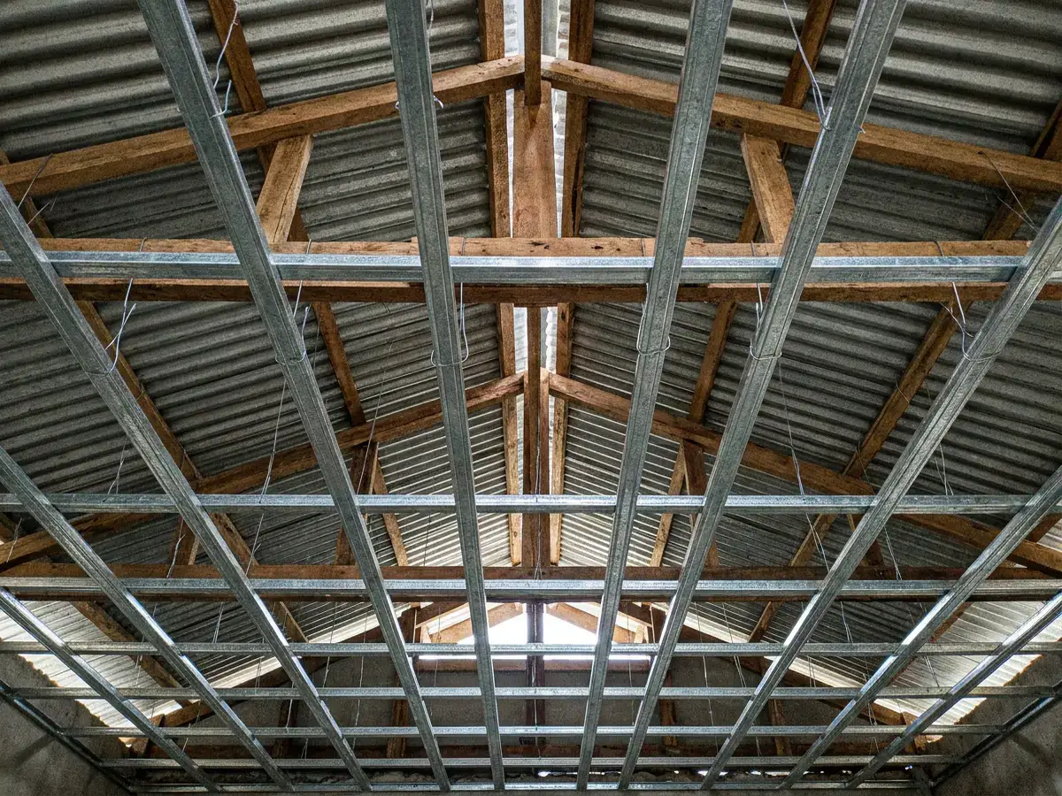 Level grid of metal furring for a ceiling before the boards go on